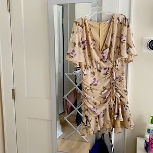 Beige floral print dress with faux wrap top and ruched bottom. Worn once.